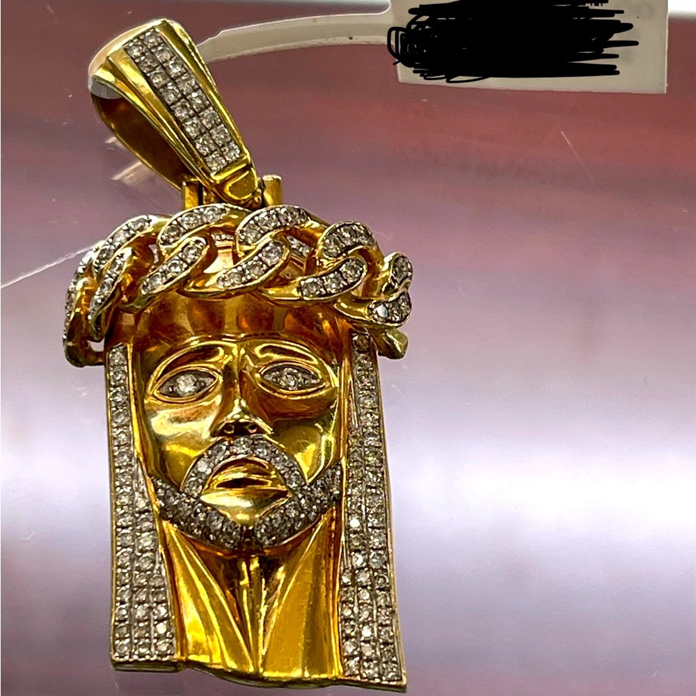 14kt gold charm Jesus with diamonds